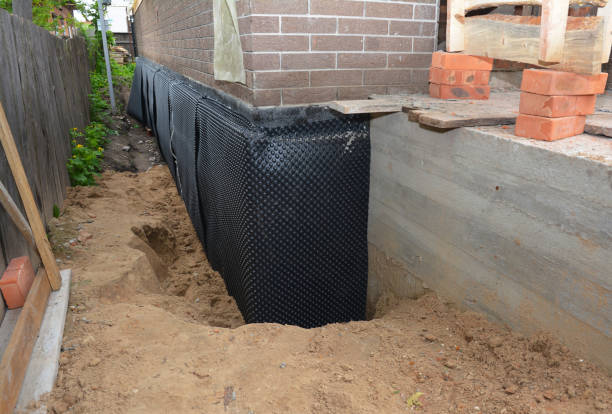 SJ Waterproofing Pros technician performing targeted Foundation Crack Repair assessment in Roachdale, IN